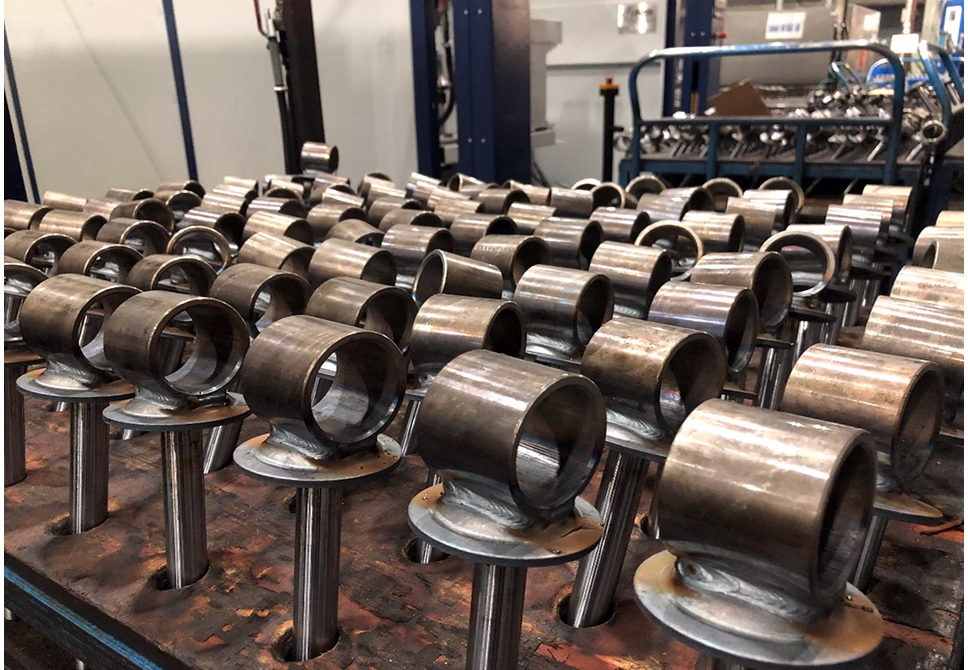 Готовые изделия роботизированного комплекса для MIG/MAG сварки штоков и корпусов амортизаторов